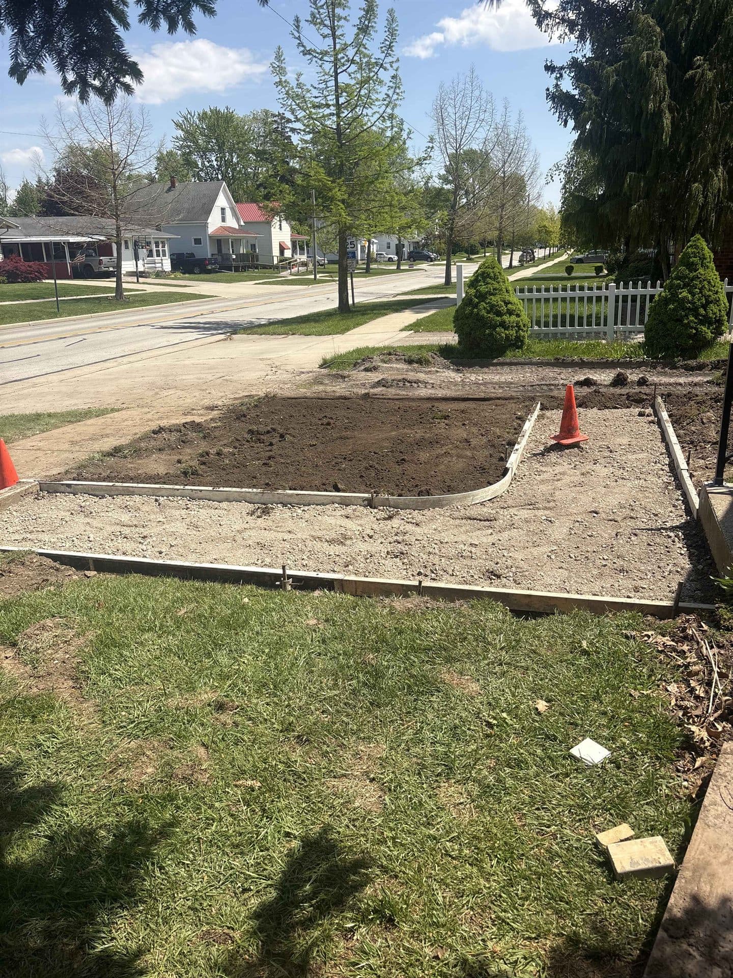 Wooden forms staked out and graded for a concrete pour